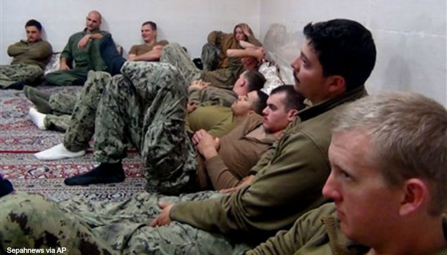 Iranian Revolutionary Guards on Wednesday Jan. 13 2016 shows detained American Navy sailors in an undisclosed location in Iran