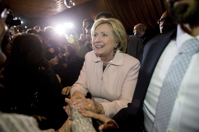 Democratic presidential candidate Hillary Clinton greets members of the audience after speaking at a rally at the Col Ballroom in Davenport Iowa Friday J