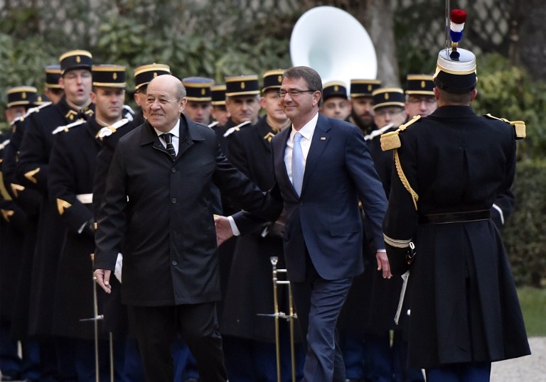 French Defense Minister Jean Yves Le Drian left welcomes US Defense Secretary Ashton Carter before a meeting with their British Dutch Australian Italian and German counterparts to discuss the fight against the Islamic State