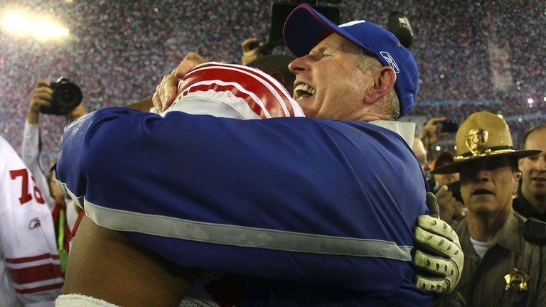 Umenyiora and Coughlin celebrate their 2008 Super Bowl win