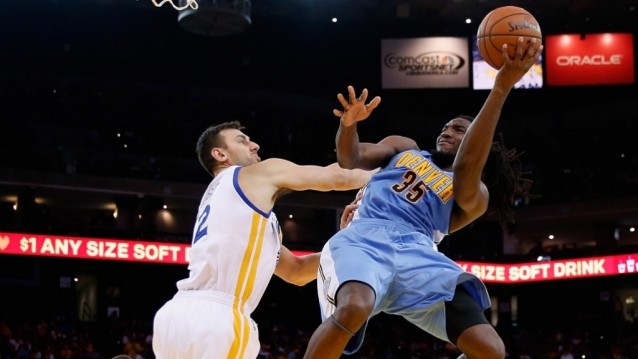 Undermanned Warriors hold off Nuggets, stay unbeaten at home