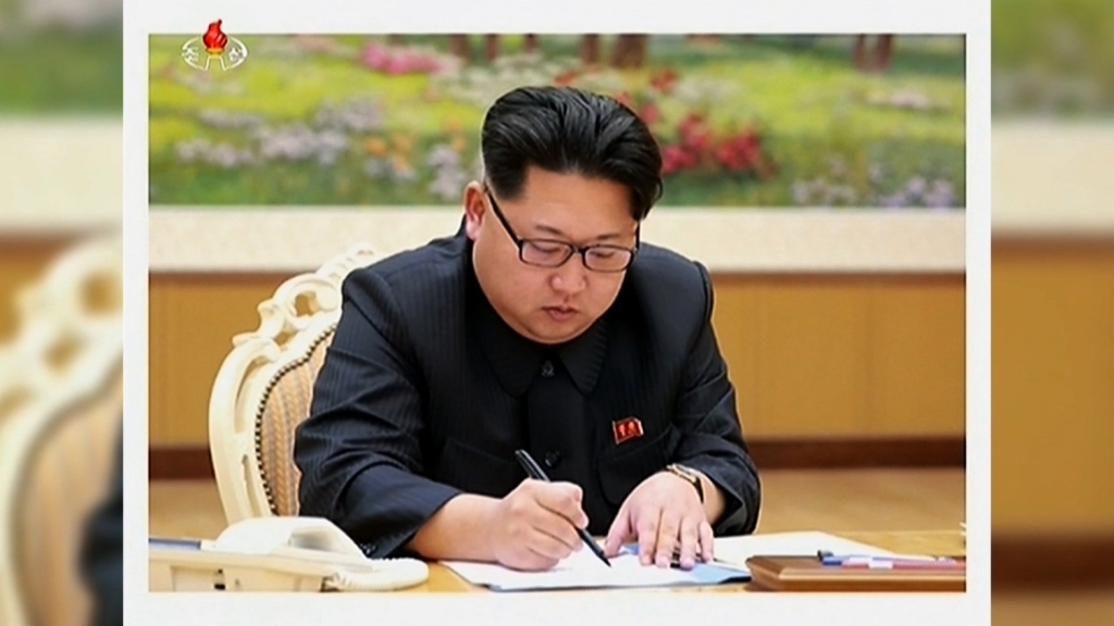 A document signed by North Korea's leader Kim Jong Un seen in footage aired on North Korean state television read'Make the world to look up to our strong nuclear country and labor party by opening the year with exciting noise of the first