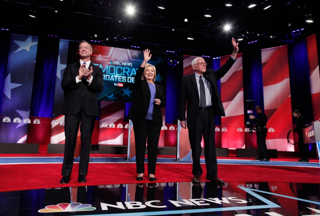 Democratic U.S. presidential candidates former Governor Martin O'Malley former Secretary of State Hillary Clinton and Senator Bernie Sanders pose together before the start of the NBC News- You Tube Democratic presidential candidates debate in Charl