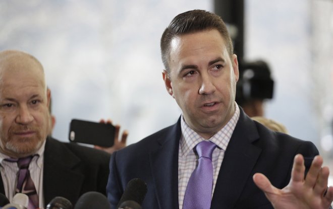 Mark Smolens left and Brian Coffman right attorneys for the family of Cedrick Chatman who was shot and killed by Chicago police in 2013 speak at a news conference at the federal courthouse Thursday Jan. 14 2016 in Chicago. A federal judge on Thursd