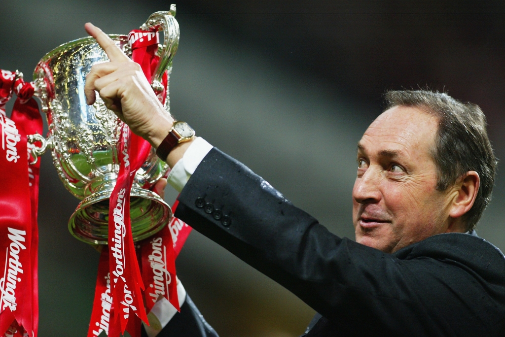 Liverpool manager Gerard Houllier celebrates winning the Worthington Cup