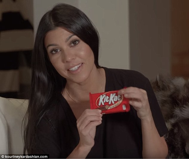 While most of us don't think twice before scoffing down a chocolate bar Kourtney Kardashian has a more laborious approach to eating her sweet treats