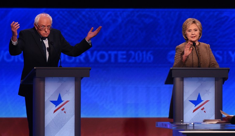 US Democratic presidential hopefuls Hillary Clinton and Bernie Sanders participate in the Democratic Presidential Debate hosted by ABC News at Saint Anselm College in Manchester New Hampshire