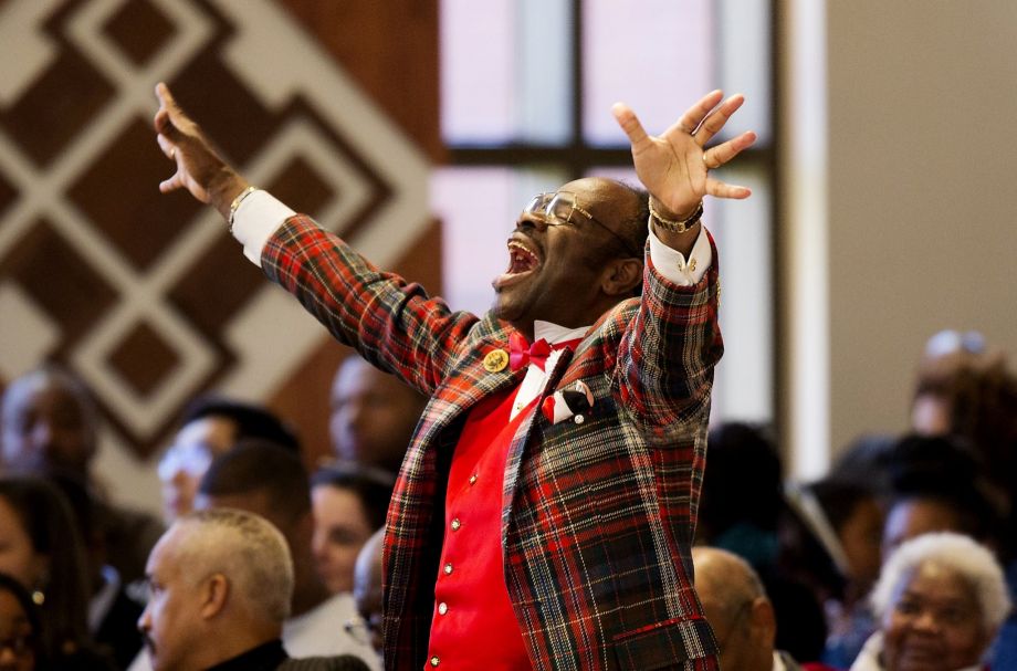 Cal Murrell known as'The Happy Preacher' exclaims during the Rev. Martin Luther King Jr. holiday commemorative service at Ebenezer Baptist Church in Atlanta where King preached