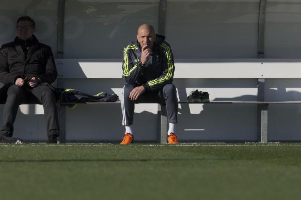 Real Madrid's newly appointed coach Zinedine Zidane sits