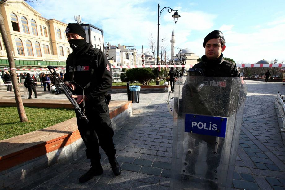 Policemen secure an area at the historic Sultanahmet district which is popular with tourists after an explosion in Istanbul Tuesday Jan. 12 2016. The private Dogan news agency says at least two people were hospitalized following an explosion in the