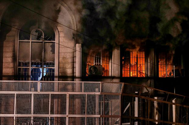 Iranian protesters set fire to the Saudi Embassy in Tehran during a demonstration against the execution of prominent Shiite Muslim cleric Nimr al Nimr by Saudi authorities