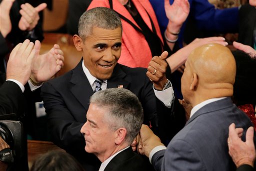 President Barack Obama gestures as he arrives on Capitol Hill in Washington Tuesday Jan. 12 2016 before giving his State of the Union address before a joint session of Congress