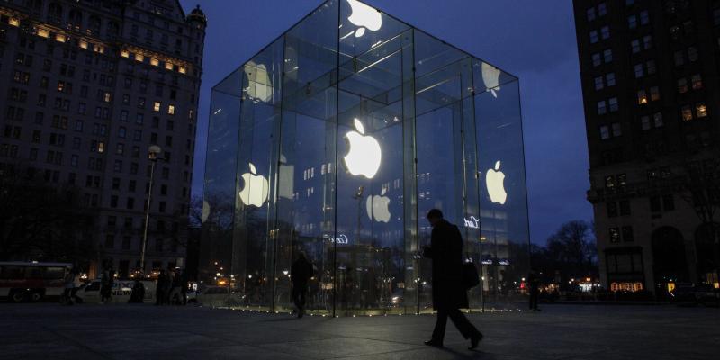 A man walks outside the Apple store on the Fifth Avenue in New York on Wednesday