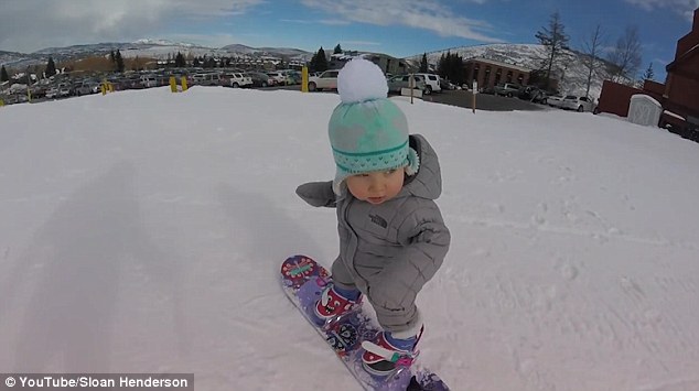 A natural The 14-month-old showed off her ability on a snowboard despite having only just learned to walk