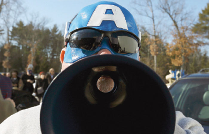 A protester shouts slogans outside of US Republican presidential candidate Marco Rubio campaign event in Hudson New Hampshire on Sunday. — Reuters