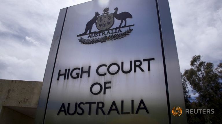 A sign stands outside the High Court of Australia in Canberra Australia in this