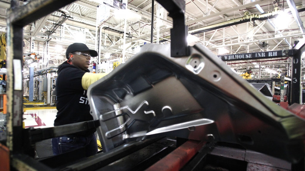 A worker is shown last month at the Fiat Chrysler Automobiles Warren Stamping Plant in Warren Mich