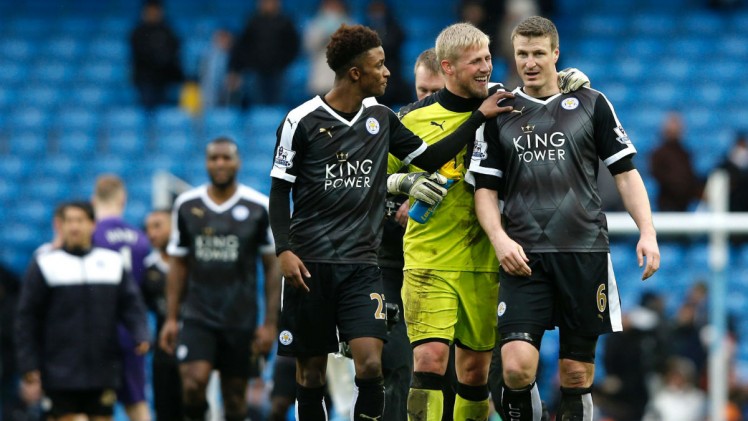 ADRIAN DENNIS  AFP  Getty Images Demarai Gray and keeper Kasper Schmeichel celebrate with Robert Huth after the game