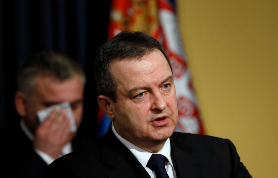 Serbian Foreign Minister Ivica Dacic speaks during a news conference in Belgrade Serbia Saturday Feb. 20 2016. Dacic says two Serbian embassy staffers who had been held hostage since November are believed to have been killed in Friday's U.S. airstrike