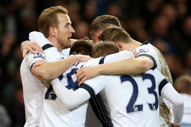 Harry Kane celebrates scoring the third goal with team mates