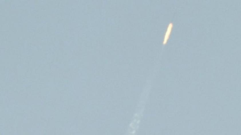 An object which appeared to be a rocket was spotted above North Korean territory from the Chinese border city of Dandong