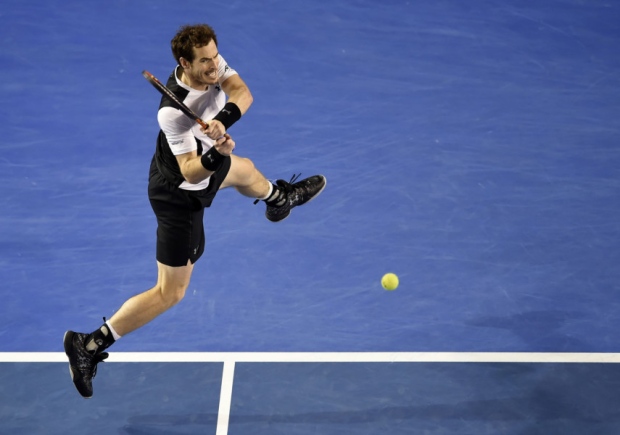 Andy Murray plays a backhand return en route to victory over Milos Raonic in the Australian Open semi-finals