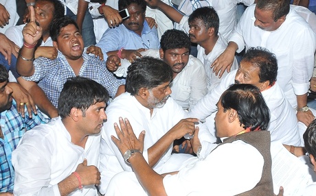 TPCC president N Uttam Kumar Reddy along with party leaders and workers staging a dharna in front of DGP’s office in Hyderabad on Tuesday demanding arrest of MIM president Asaduddin Owaisi | A Radhakrishna