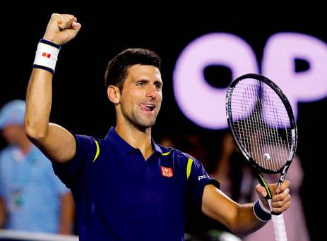 Novak Djokovic of Serbia celebrates after defeating Roger Federer of Switzerland in their semifinal match at the Australian Open tennis championships in Melbourne Australia Thursday Jan. 28 2016