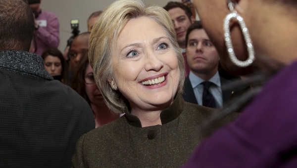 Hillary Clinton talks with a parishioner after addressing the congregation about the Flint water crisis at a Baptist church in Flint Michigan Feb. 7 2016