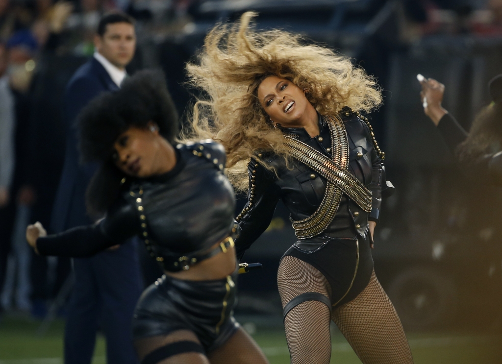 Beyonce performs during halftime of the NFL Super Bowl 50 football game in Santa Clara Calif. Beyonce is working overtime this weekend After releasing a new song Saturday and performing at the Super Bowl