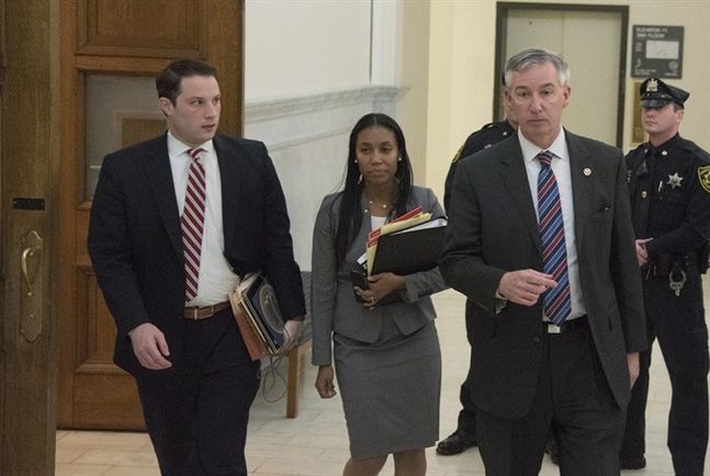 Newly elected District Attorney Kevin Steele right leaves court with M. Stewart Ryan left and Kristen Feden after a pretrial hearing for Bill Cosby Tuesday Feb. 2 2016 in Norristown Pa. Former Montgomery County District Attorney Bruce Castor took