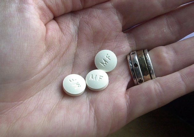 Bill Greenblatt  Getty Images
Hand holding three mifepristone pills