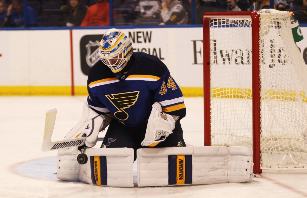 St. Louis Blues goaltender Jake Allen makes a pad save in the second perod against the San Jose Sharks at the Scottrade Center in St. Louis