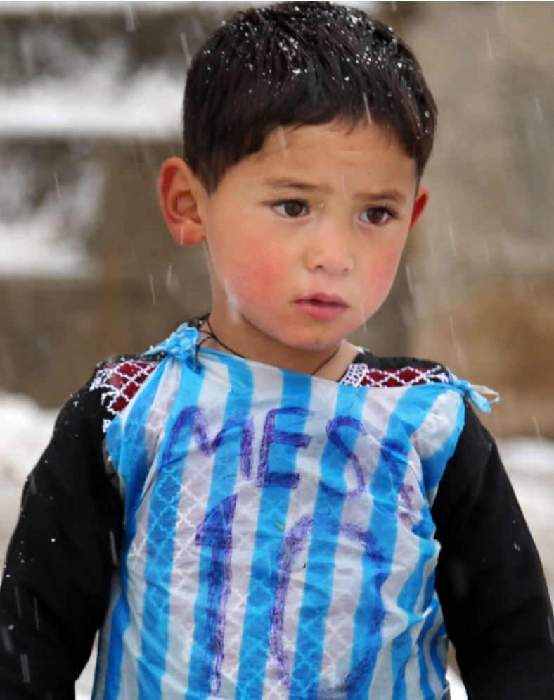 PICTURES: Boy with homemade Lionel Messi shirt is loving his new signed top