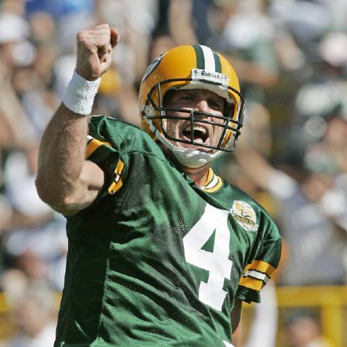 Green Bay Packers quarterback Brett Favre reacts after throwing a touchdown pass to Bubba Franks during the first half of an NFL football game against the San Diego Chargers in Green Bay Wis. Favre is