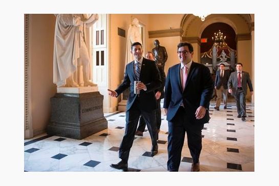 House Speaker Paul Ryan of Wis. center walks to the House chamber on Capitol Hill in Washington Friday Feb. 12 2016 as Republicans and Democrats joined together to overwhelmingly approve legislation that hits North Korea with more stringent sanction