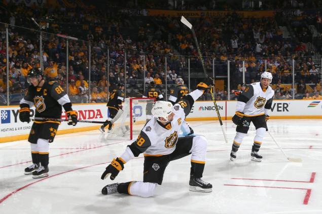 John Scott celebrates his goal which ties the Pacific's first game with Central at 1