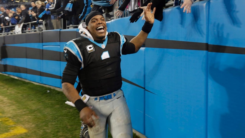 Carolina Panthers Cam Newton celebrates his teams 15-1 regular season record following an NFL football game against the Tampa Bay Buccaneers in Charlotte N.C