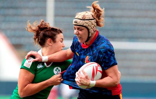 Berta Garcia of Spain vies for the ball with Louise Galvin of Ireland during their World Rugby Women's Sevens Series match in Barueri Brazil. AFP