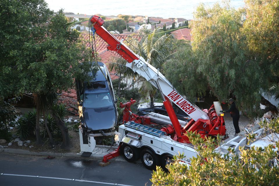 Careening car ends up on roof of Southern California house