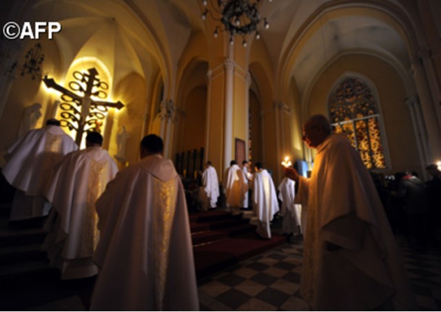 Catholic priests inside Moscow's Cathedral of the Immaculate Conception- AFP