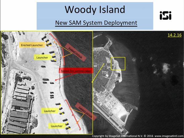 This image with notations provided by Image Sat International N.V. Wednesday Feb. 17 2016 shows satellite images of Woody Island the largest of the Paracel Islands in the South China Sea. A U.S. official confirmed that China has placed a surface-to-ai