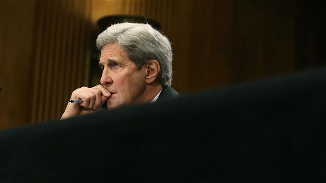 US Secretary of State John Kerry listens to comments during a Senate Foreign Relations Committee hearing on Capitol Hill