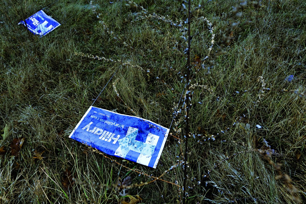 DERRY NH- FEBRUARY 02 Campaign signs for Democratic presidential candidate Hillary Clinton lie blown over near the roadside