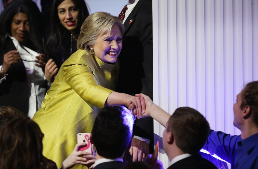 Democratic presidential candidate Hillary Clinton greets guests after participating in the PBS News Hour Democratic presidential candidate debate at the University of Wisconsin-Milwaukee