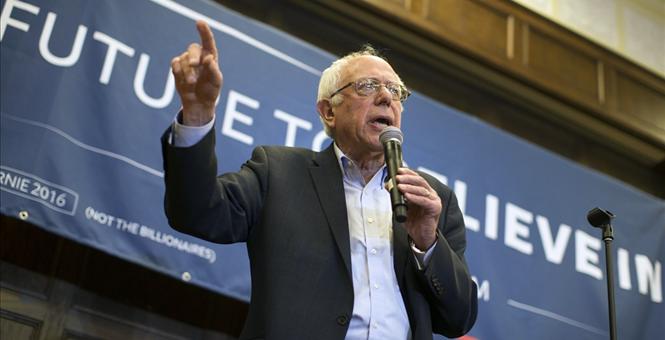 In final Iowa blitz, an outraged Clinton channels Sanders