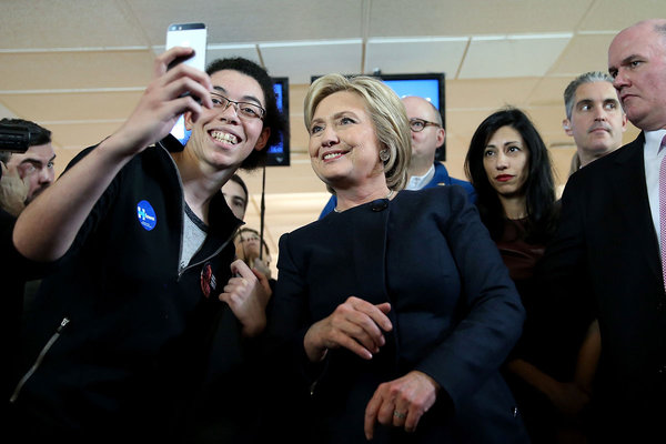 Hillary Clinton greets supporters at a “get out the caucus” event at the Adel Family Fun Center in Adel Iowa. She said of Republican economic policies “Didn’t work. Can’t work. Won’t work.”