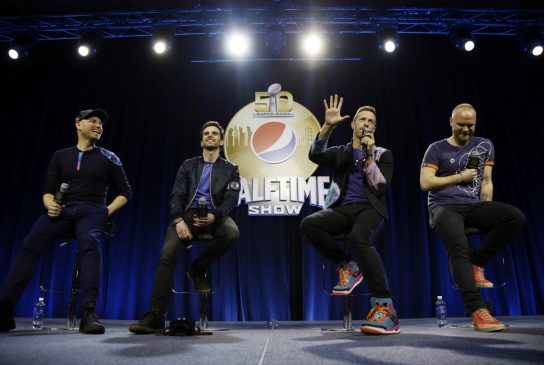 Coldplay members Jonny Buckland left to right Guy Berryman Chris Martin and Will Champion know'absolutely nothing about football but will be the feature band for the halftime show at Super Bowl 50