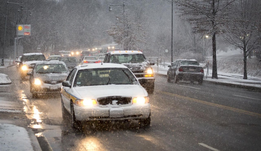 Commuters face a wet snowy drive on Rt. 2 in Cambridge Friday morning