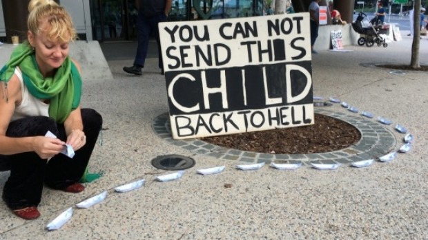 Scotia Monkivitch was one of about 50 protesters still at the vigil for baby Asha at Brisbane's Lady Cilento Hospital on Sunday morning